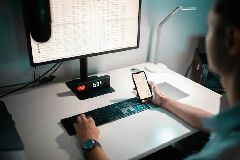 A smartphone resting on a plain table